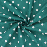 polka dot coated cotton in green