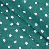 polka dot coated cotton in green