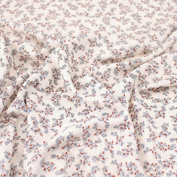 Cream and Orange Dainty Leaf Stems Viscose Rayon Print Pattern Dressmaking Flowers Fabric Soft Material Cream
