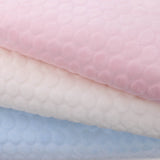 baby soft fleece in large dimple dots soft cream