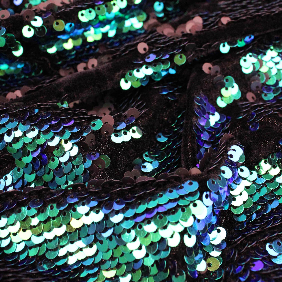 changing tone medium sequins on black velvet fabric Turquoise