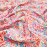 Fleur Luxury Pure Cotton Satin Sateen Dressmaking Fabric - Salmon Pink Mesmerizing Circles