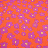 Coloured Purple Flowers on Orange