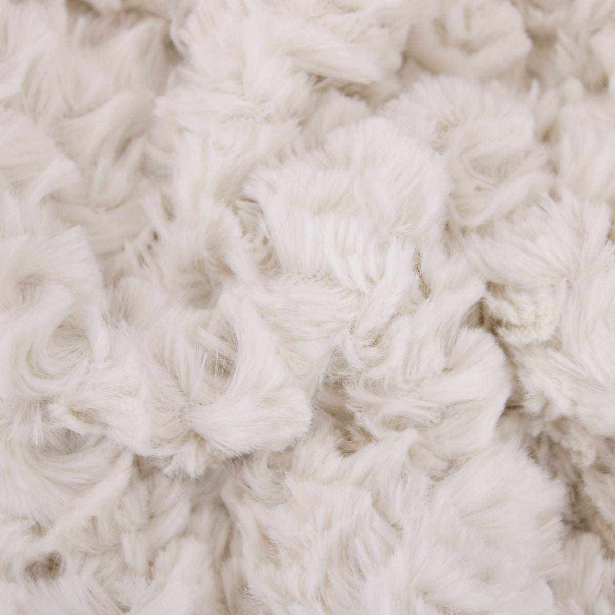 curly faux vegan fur teddy fabric Cream