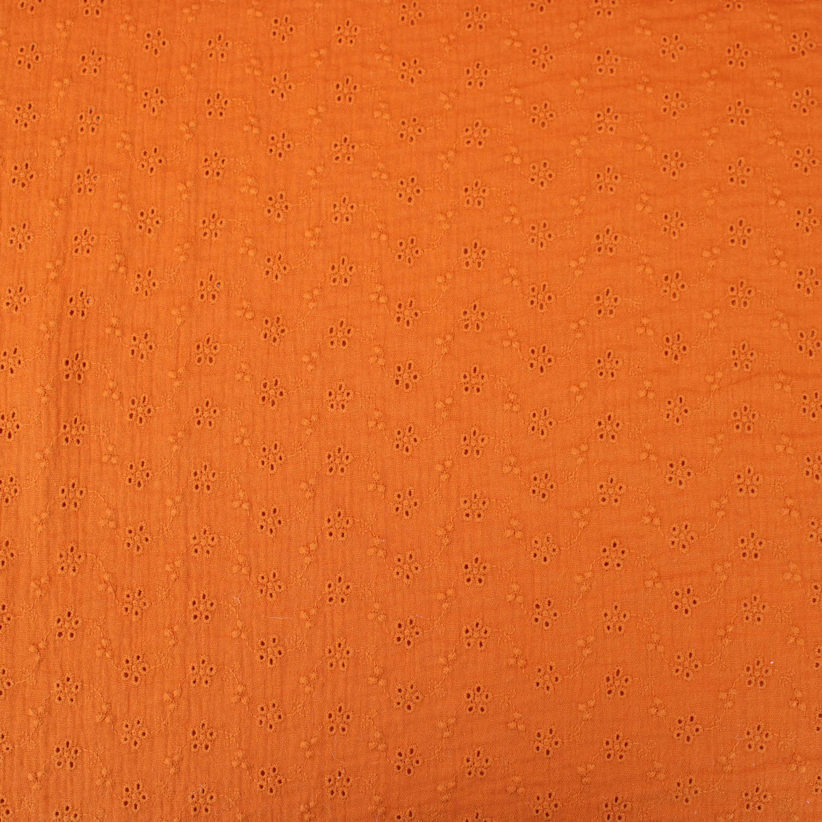 daisy emboidered organic cotton dressmaking fabric Small Rust