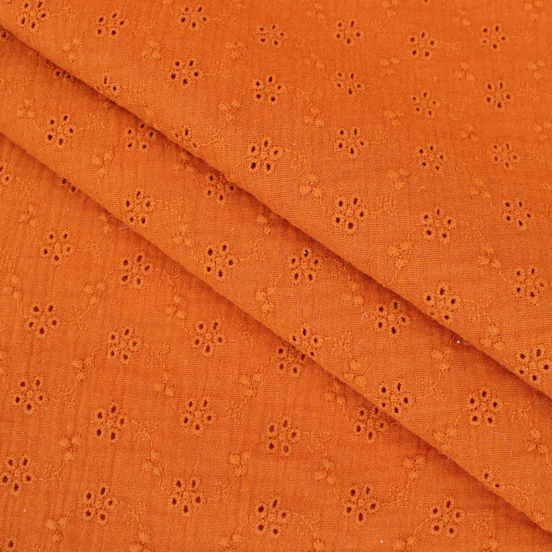 daisy emboidered organic cotton dressmaking fabric Small Rust