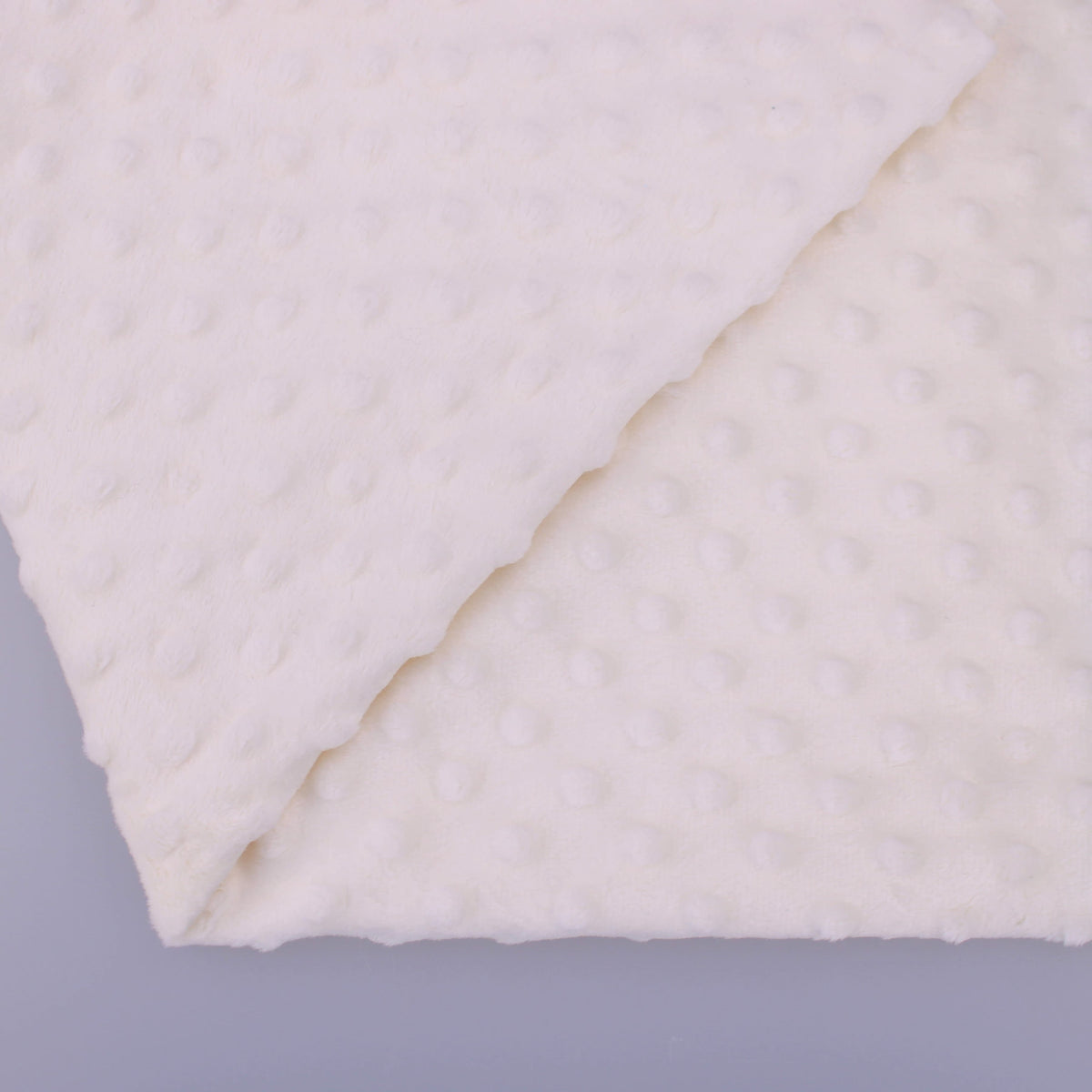 baby soft fleece in dimple dots Soft Cream
