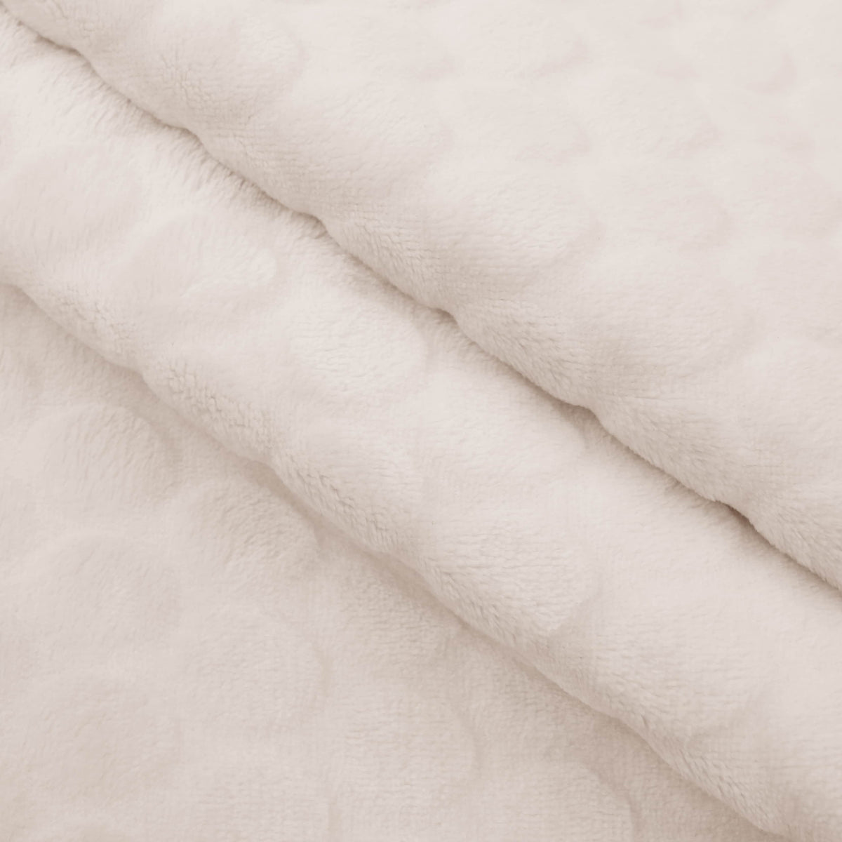 baby soft fleece in large dimple dots soft cream