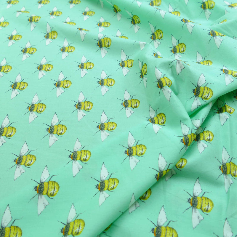 soft lightweight 100% cotton poplin dressmaking fabric Pastel Green