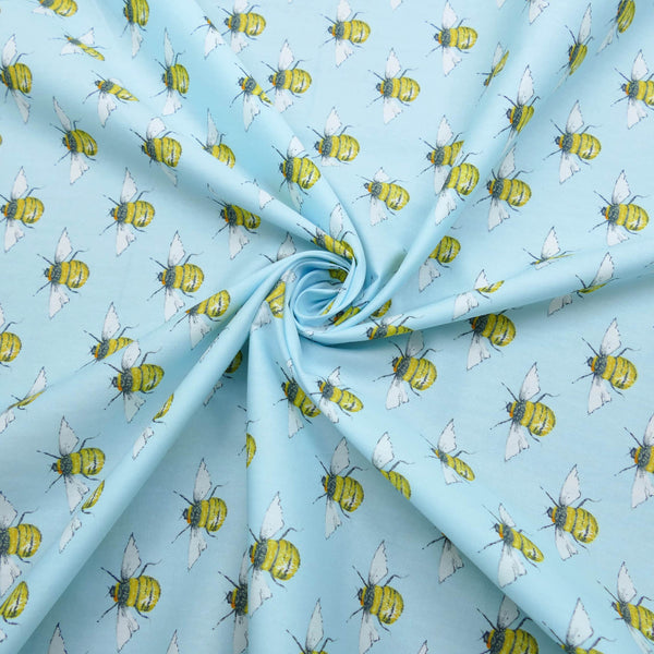soft lightweight 100% cotton poplin dressmaking fabric Sky Blue