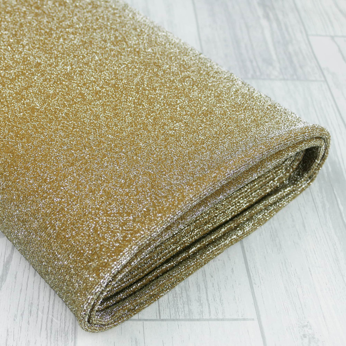 4 way stretch knitted sparkling lurex dressmaking fabric Gold