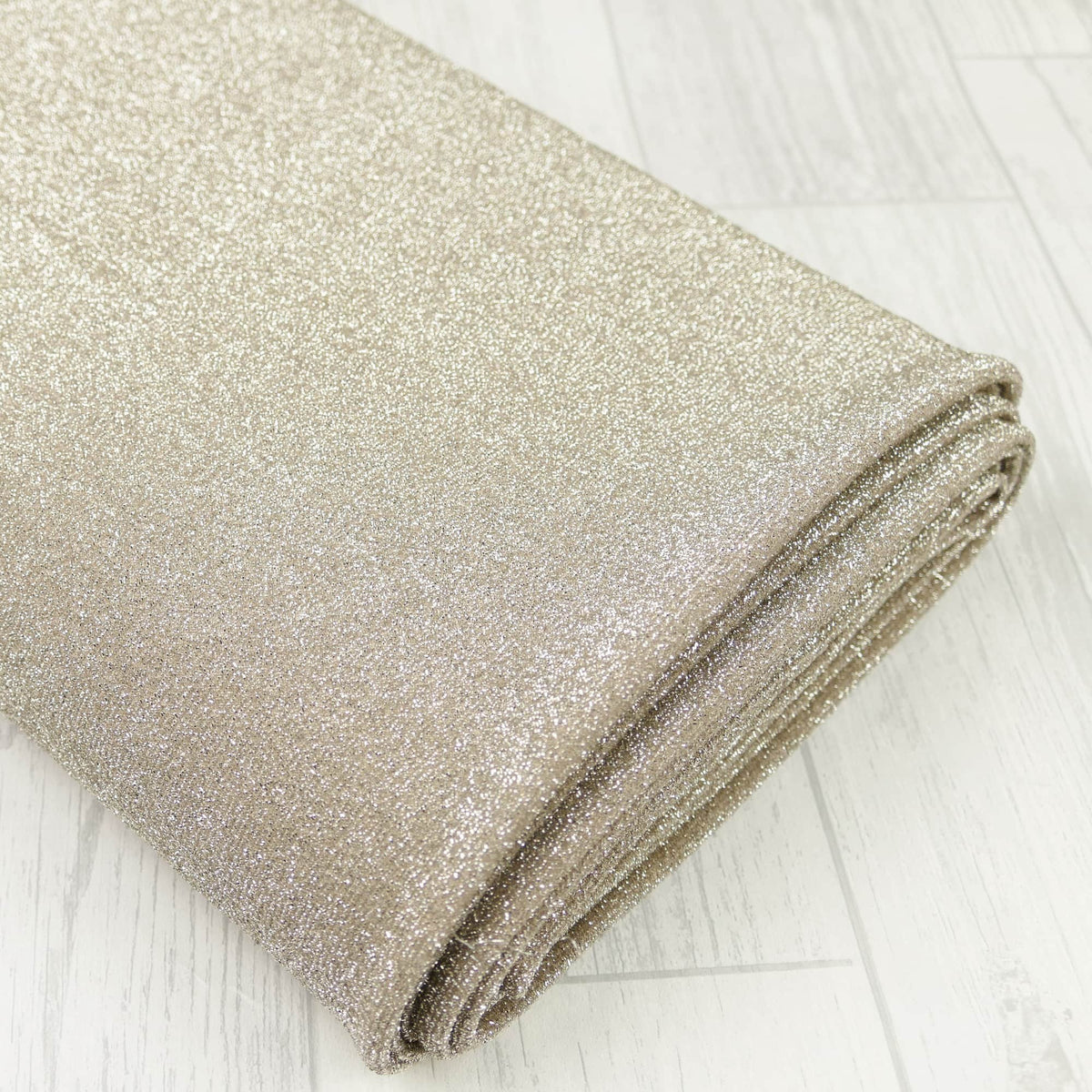 4 way stretch knitted sparkling lurex dressmaking fabric Sandcastle