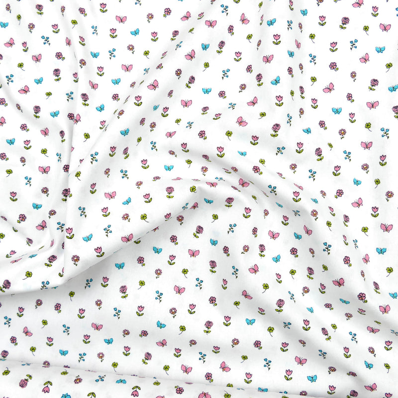 soft lightweight pure cotton poplin dressmaking fabric White