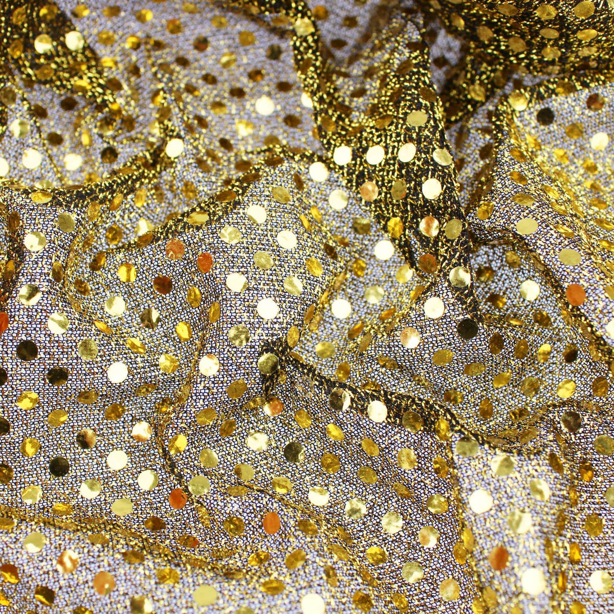 stuck on sequins on shinny see through backing fabric Gold on Black