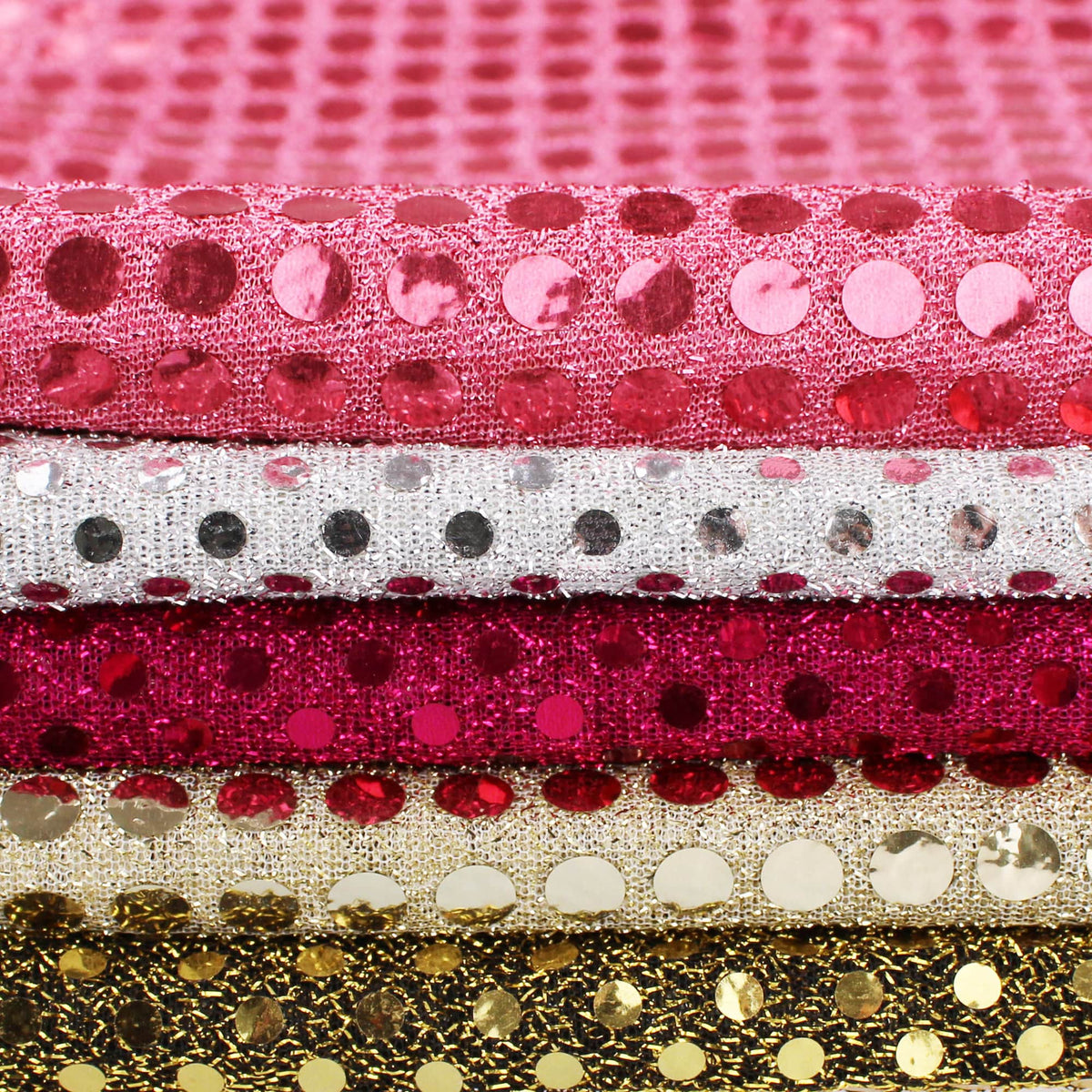 stuck on sequins on shinny see through backing fabric Gold on Black