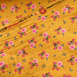 organic 100% cotton double gauze in winterberry floral print Mustard